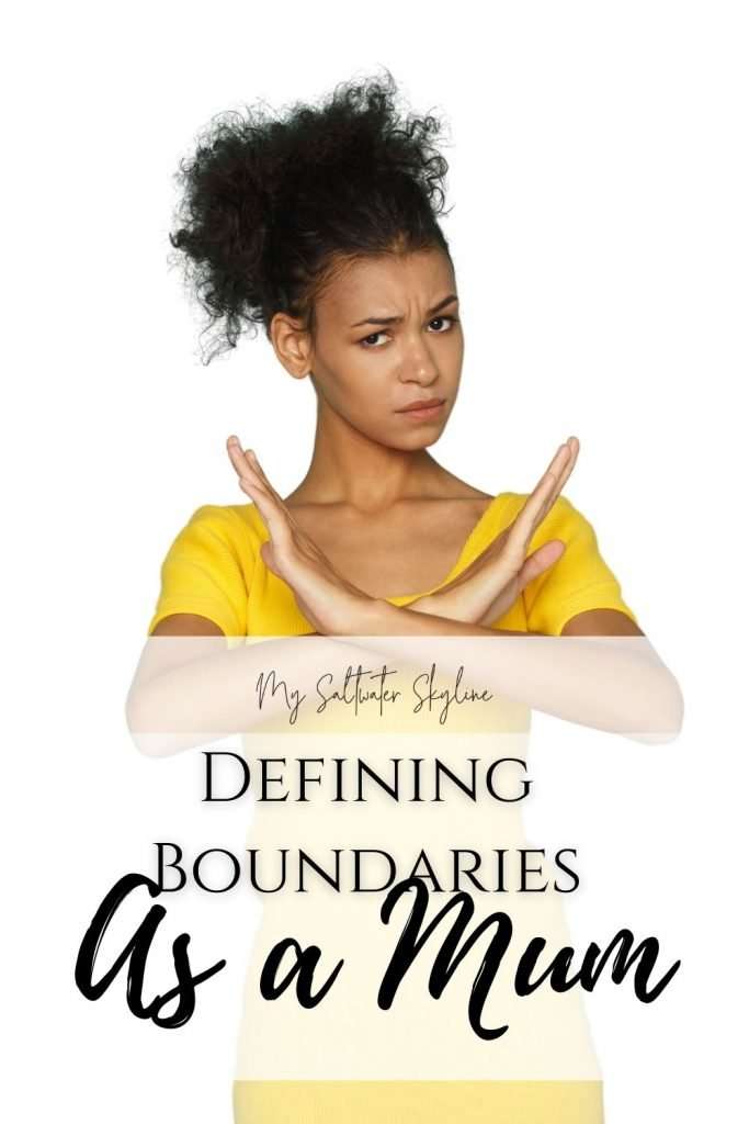 woman-holding-up-hands-in-an-x-formation-signaling-stop-defining-boundaries-as-a-mum-blog-post
