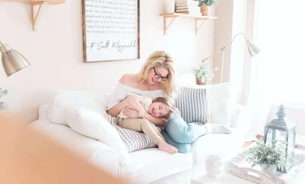mother-and-child-playful-on-couch-leaving-a-legacy-of-love-blog-post