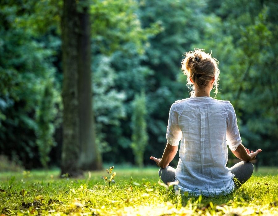 woman-meditating-outdoors-more-than-we-think-blog-post