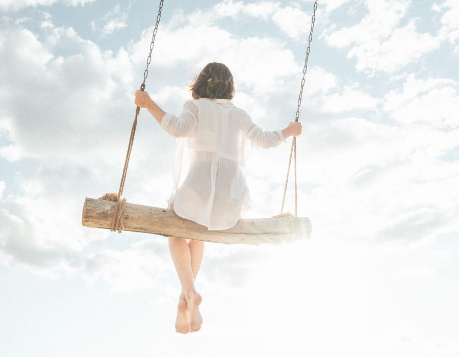 woman-on-swing-from-behind-lifes-highs-and-lows-blog-post