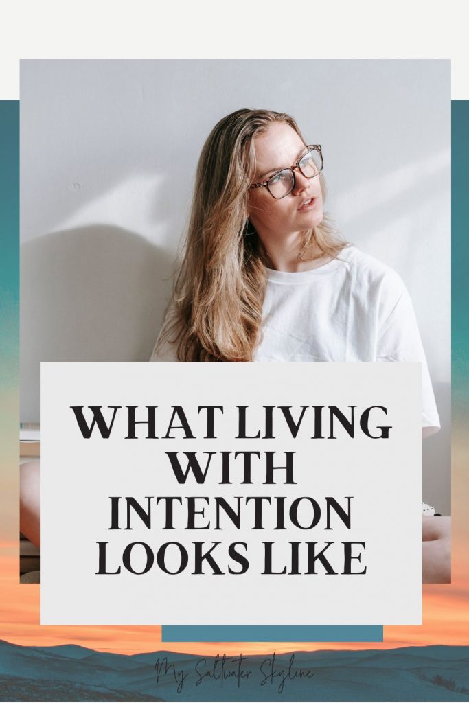 woman-reading-text-what-living-with-intention-looks-like-blog-pin