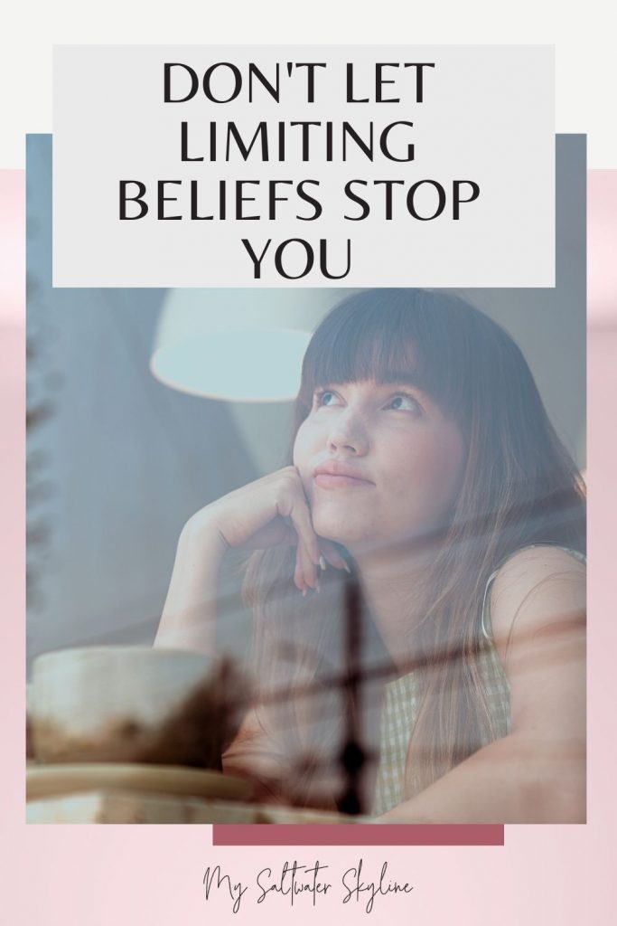 womam-at-cafe-window-deep-thought-example-of-limiting-beliefs-blog-pin