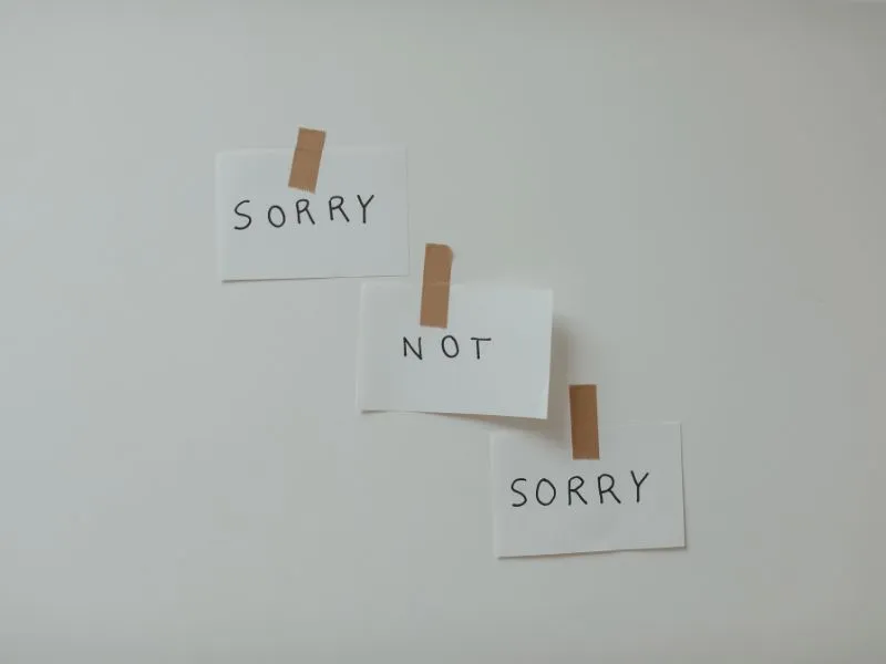 sorry-not-sorry-written-on-paper-stop-apologizing-blog-post